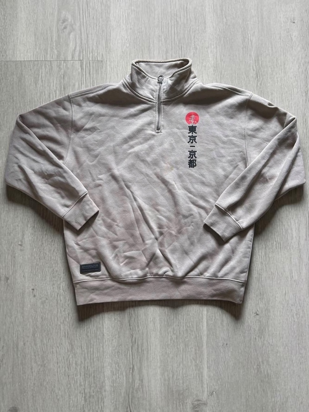 Primark Beige Quarter-Zip Sweater with Red Tokyo Graphic